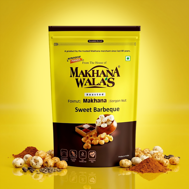 A stand-up pouch of Makhana Wala's Roasted Sweet Barbeque foxnut makhana, set against a bright yellow background with scattered makhana and spices at the base.